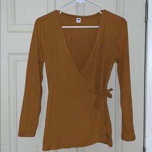 Mustard color shirt that ties